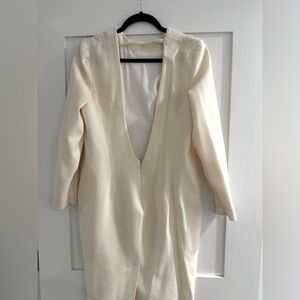 Ivory knee length Alexander McQueen dress. Open in the back.